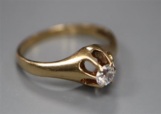 A 14k and claw set solitaire diamond ring, size I, gross 2.4 grams.